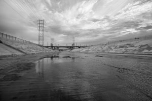 The gritty Los Angeles river in black and white.